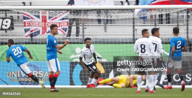 Alfredo Morelos of Scottish club Rangers FC beats goal keeper Cassio of Brazilian club Corinthians for a second half goal during their Florida Cup...