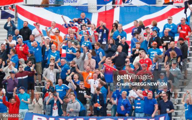 Fans of Scottish club Rangers FC cheer their team after a second half goal against Brazilian club Corinthiansl during their Florida Cup soccer game...