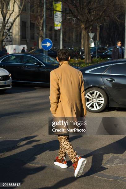 Simone Marchetti is seen on the set of the Armani Advertising Campaign street style during Milan Men's Fashion Week Fall/Winter 2018/19 on January...