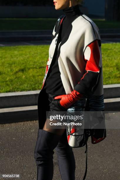 Elina Halimi is seen on the set of the Armani Advertising Campaign street style during Milan Men's Fashion Week Fall/Winter 2018/19 on January 13,...