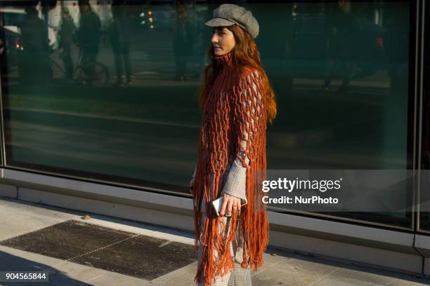 Guest is seen on the set of the Armani Advertising Campaign street style during Milan Men's Fashion Week Fall/Winter 2018/19 on January 13, 2018 in...