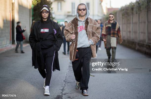 Alessandro Altomare wearing track suit pants, cap is seen outside Diesel during Milan Men's Fashion Week Fall/Winter 2018/19 on January 13, 2018 in...