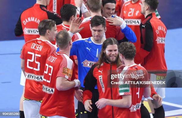 Denmark's Mikkel Hansen and teammates celebrate their victory over Hungary following their match in the 13th edition of the EHF European Men's...