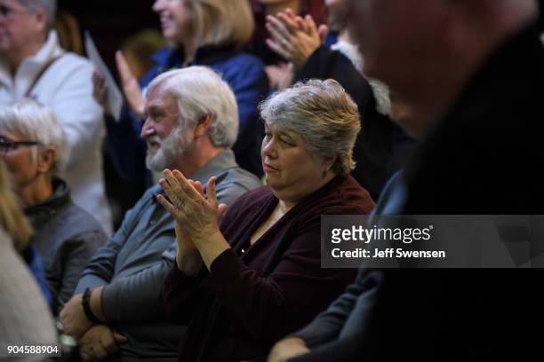 Members of the audience listen to Democrat Conor Lamb, a former U.S. Attorney and US Marine Corps veteran running to represent Pennsylvania's 18th...