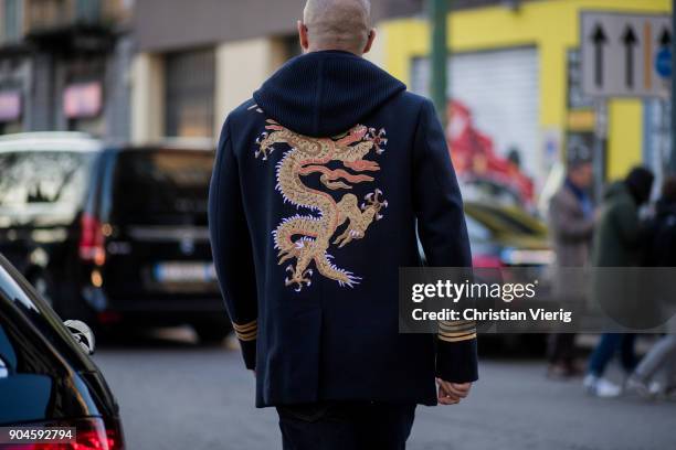 Milan Vukmirovic wearing navy jacket is seen outside Marni during Milan Men's Fashion Week Fall/Winter 2018/19 on January 13, 2018 in Milan, Italy.