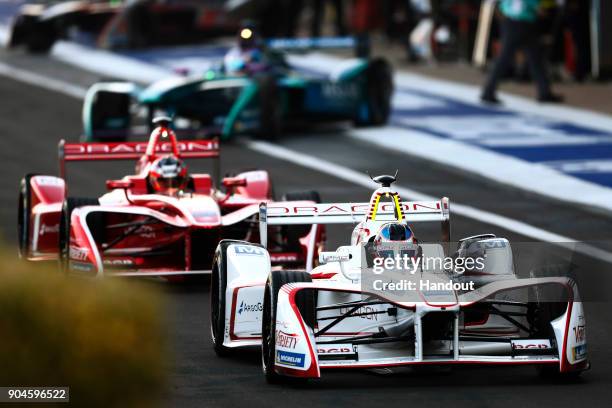 In this handout provided by FIA Formula E - Jose Maria Lopez , Dragon, Penske EV-2, and Jerome D'Ambrosio , Dragon, Penske EV-2 in action during the...