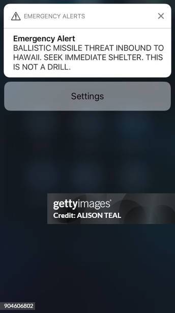Screen shot take by Hawaiian citizen Alison Teal shows the screen of her mobile phone with an alert text message sent to all Hawaiian citizens on...