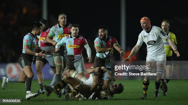 Alofa Alofa of Harlequins takes on the Wasps defence during the European Rugby Champions Cup match between Harlequins and Wasps at Twickenham Stoop...