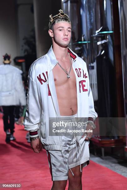 Cameron Dallas walks the runway at the Dolce & Gabbana Unexpected Show show during Milan Men's Fashion Week Fall/Winter 2018/19 on January 13, 2018...