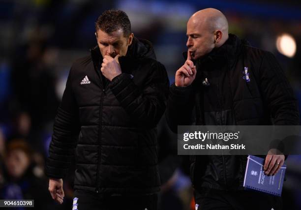 Steve Cotterill manager and Lee Carsley assistant manger of Birmingham City walk back to the tunnel after the Sky Bet Championship match between...