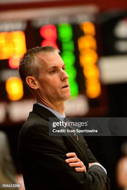 Tim Craft head coach Gardner-Webb University Runnin Bulldogs watches his team pull out a 54-59 win over the Radford University Highlanders, Friday,...