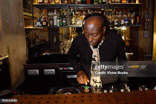 Dj Acyde performs at the GQ Milan Cocktail Party during Milan Men's Fashion Week Fall/Winter 2018/19 on January 13, 2018 in Milan, Italy.