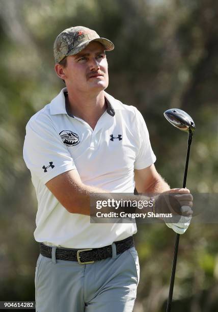 John Peterson of the United States plays his shot from the first tee during round three of the Sony Open In Hawaii at Waialae Country Club on January...