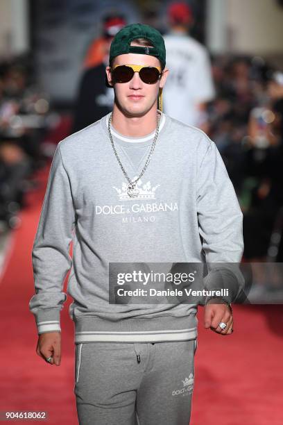 Model walks the runway at the Dolce & Gabbana Unexpected Show during Milan Men's Fashion Week Fall/Winter 2018/19 on January 13, 2018 in Milan, Italy.