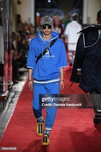 Model walks the runway at the Dolce & Gabbana Unexpected Show during Milan Men's Fashion Week Fall/Winter 2018/19 on January 13, 2018 in Milan, Italy.