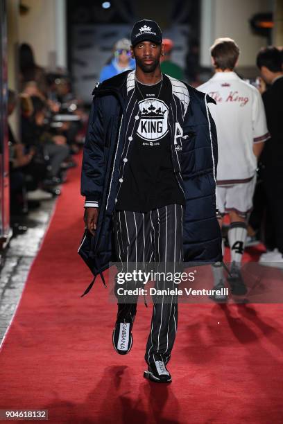 Model walks the runway at the Dolce & Gabbana Unexpected Show during Milan Men's Fashion Week Fall/Winter 2018/19 on January 13, 2018 in Milan, Italy.