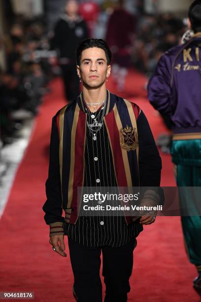 Model walks the runway at the Dolce & Gabbana Unexpected Show during Milan Men's Fashion Week Fall/Winter 2018/19 on January 13, 2018 in Milan, Italy.