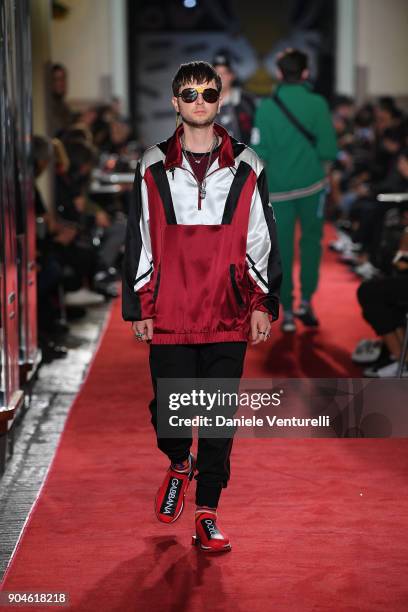 Model walks the runway at the Dolce & Gabbana Unexpected Show during Milan Men's Fashion Week Fall/Winter 2018/19 on January 13, 2018 in Milan, Italy.