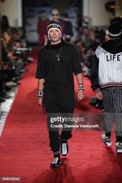 Model walks the runway at the Dolce & Gabbana Unexpected Show during Milan Men's Fashion Week Fall/Winter 2018/19 on January 13, 2018 in Milan, Italy.