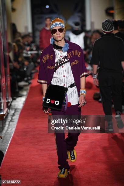 Model walks the runway at the Dolce & Gabbana Unexpected Show during Milan Men's Fashion Week Fall/Winter 2018/19 on January 13, 2018 in Milan, Italy.