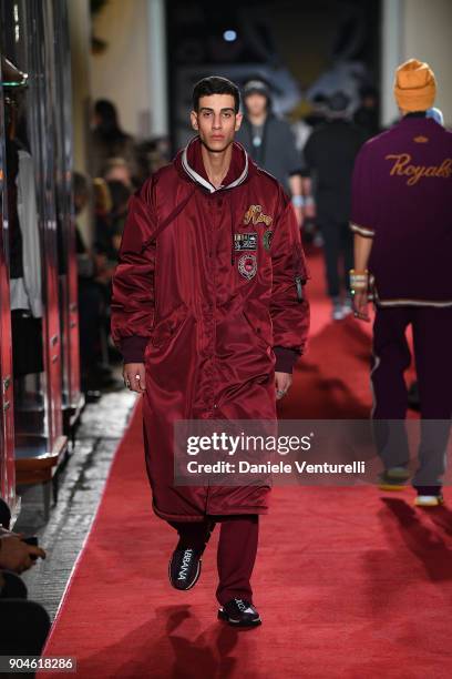 Model walks the runway at the Dolce & Gabbana Unexpected Show during Milan Men's Fashion Week Fall/Winter 2018/19 on January 13, 2018 in Milan, Italy.