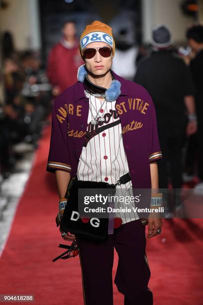 Model walks the runway at the Dolce & Gabbana Unexpected Show during Milan Men's Fashion Week Fall/Winter 2018/19 on January 13, 2018 in Milan, Italy.