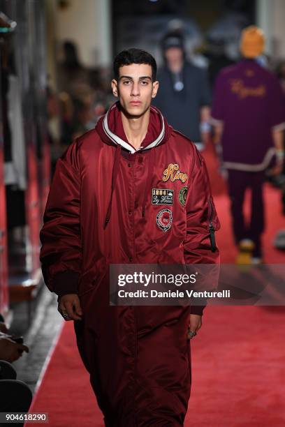 Model walks the runway at the Dolce & Gabbana Unexpected Show during Milan Men's Fashion Week Fall/Winter 2018/19 on January 13, 2018 in Milan, Italy.