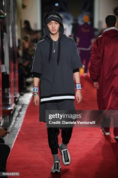 Model walks the runway at the Dolce & Gabbana Unexpected Show during Milan Men's Fashion Week Fall/Winter 2018/19 on January 13, 2018 in Milan, Italy.