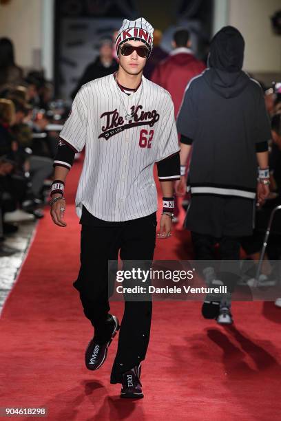 Model walks the runway at the Dolce & Gabbana Unexpected Show during Milan Men's Fashion Week Fall/Winter 2018/19 on January 13, 2018 in Milan, Italy.