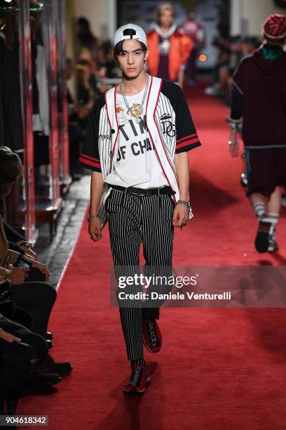 Model walks the runway at the Dolce & Gabbana Unexpected Show during Milan Men's Fashion Week Fall/Winter 2018/19 on January 13, 2018 in Milan, Italy.