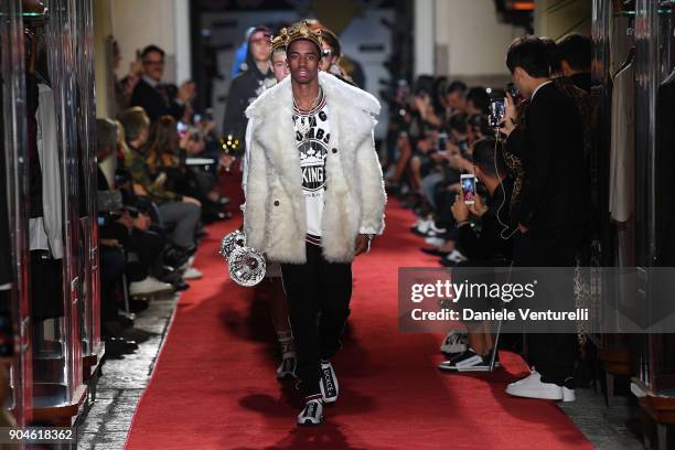 Christian Combs walks the runway at the Dolce & Gabbana Unexpected Show during Milan Men's Fashion Week Fall/Winter 2018/19 on January 13, 2018 in...