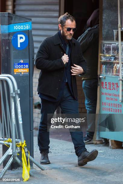 Jude Law is seen filming 'The Rhythm Section' in Chinatown on January 13, 2018 in New York City.