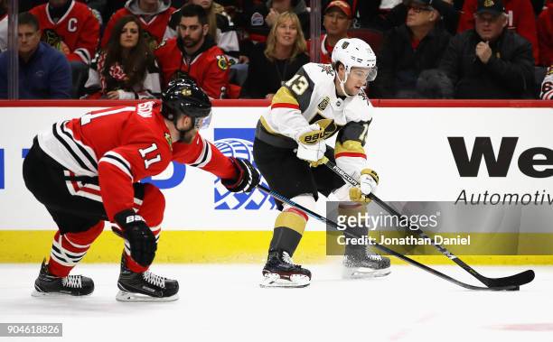 Brendan Leipsic of the Vegas Golden Knights advances the puck under pressure from Cody Franson of the Chicago Blackhawks at the United Center on...