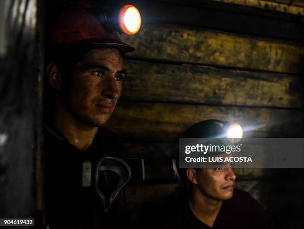 Miners work at an emerald mine in the municipality of Muzo - known as the "emerald capital of the world" - in the Colombian department of Boyaca, on...