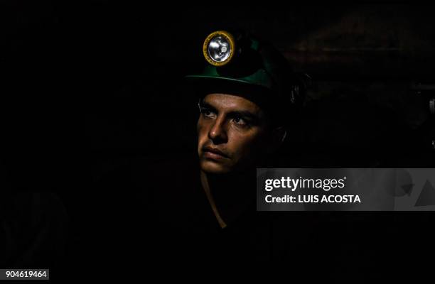 Miner works at an emerald mine in the municipality of Muzo - known as the "emerald capital of the world" - in the Colombian department of Boyaca, on...