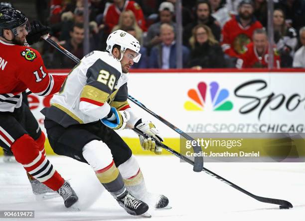 William Carrier of the Vegas Golden Knights advances past Cody Franson of the Chicago Blackhawks at the United Center on January 5, 2018 in Chicago,...