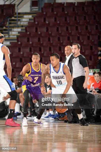 Troy Caupain of the Lakeland Magic handles the ball during the NBA G-League Showcase Game 24 between the South Bay Lakers and the Lakeland Magic on...