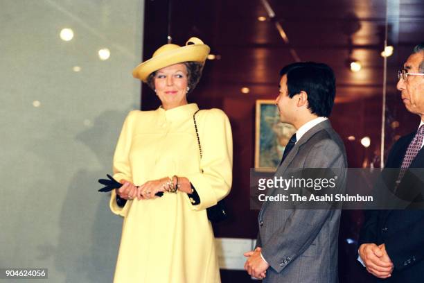 Queen Beatrix of the Netherlands, Crown Prince Naruhito and Prince Mikasa visit the Suntory Museum on October 23, 1991 in Tokyo, Japan.