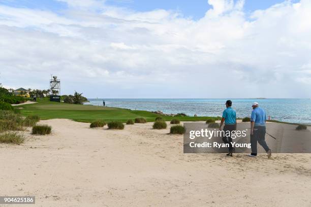 Brendon de Jonge and Curtis Luck walk up the 11th hole during the first round of the Web.com Tour's The Bahamas Great Exuma Classic at Sandals...