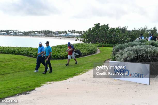 Brendon de Jonge and Curtis Luck walk up the 11th hole during the first round of the Web.com Tour's The Bahamas Great Exuma Classic at Sandals...