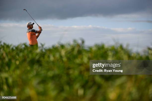 Brock MacKenzie plays his shot from the 13th tee during the first round of the Web.com Tour's The Bahamas Great Exuma Classic at Sandals Emerald Bay...