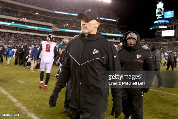 Head coach Dan Quinn of the Atlanta Falcons walks off the field after being defeating by the Atlanta Falcons with a score of 10 to 15 in the NFC...