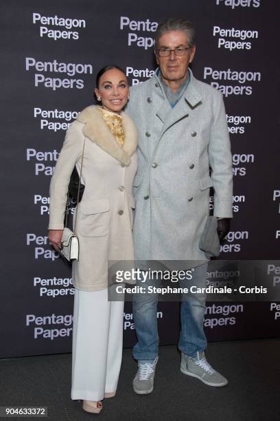 Chief Executive of the Groupe Lucien Barriere, Dominique Desseigne and Alexandra Cardinale attend 'Pentagon Papers' Premiere at Cinema UGC Normandie...