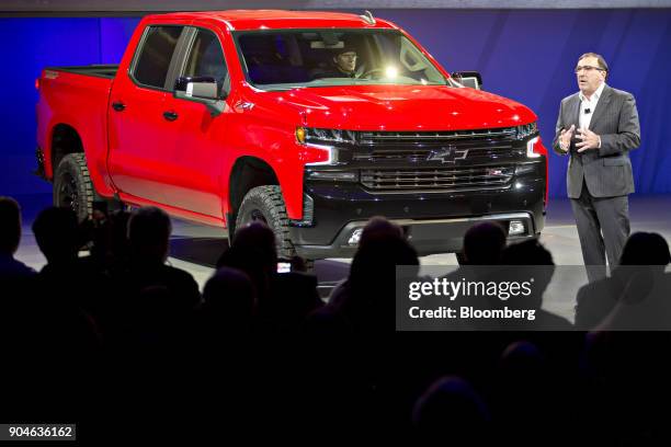 Alan Batey, executive vice president and president of General Motors Co. North America, speaks next to a 2019 Chevrolet Silverado pickup truck during...