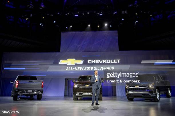 Mark Reuss, executive vice president of global product development at General Motors Co. , speaks next to 2019 Chevrolet Silverado pickup trucks...