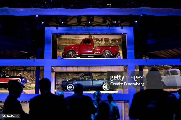 General Motors Co. Pickup trucks sit on display before a GM Chevrolet Silverado event during the 2018 North American International Auto Show in...