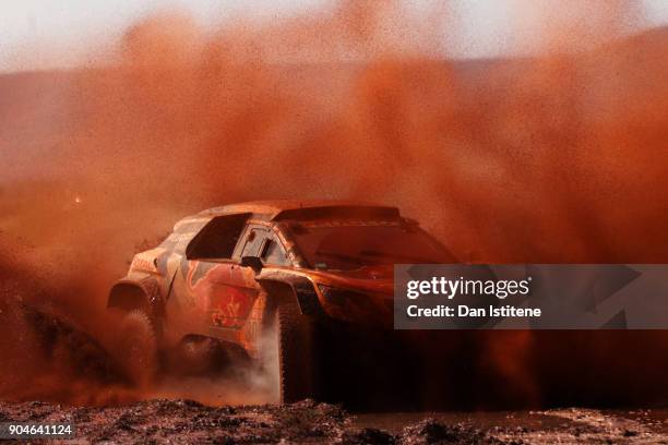 Stephane Peterhansel of France and Peugeot Total drives with co-driver Jean Paul Cottret of France in the 3008 DKR Peugeot car in the Classe : T1.4 2...