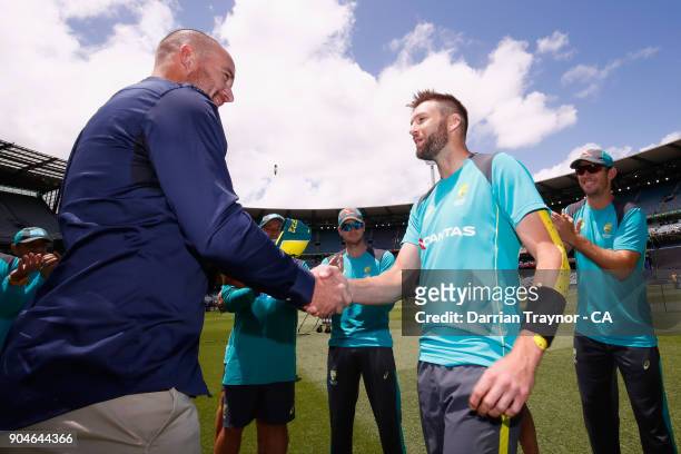 Former Austrlain player John Hastings presents Andrew Tye with his first australian cap before game one of the One Day International Series between...