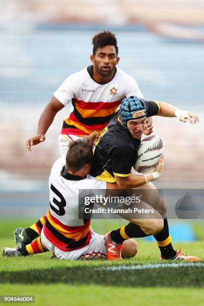 Luke Bowden of Wellington charges forward during the Bayleys National Sevens semi final cup match between Waikato and Wellington at Rotorua...