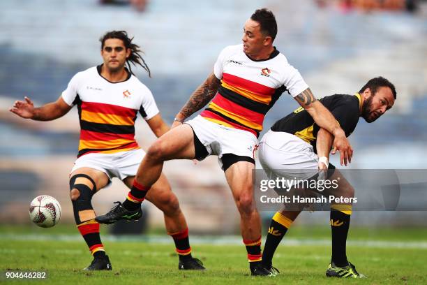 Zac Guilford of Waikato kicks the ball through during the Bayleys National Sevens semi final cup match between Waikato and Wellington at Rotorua...